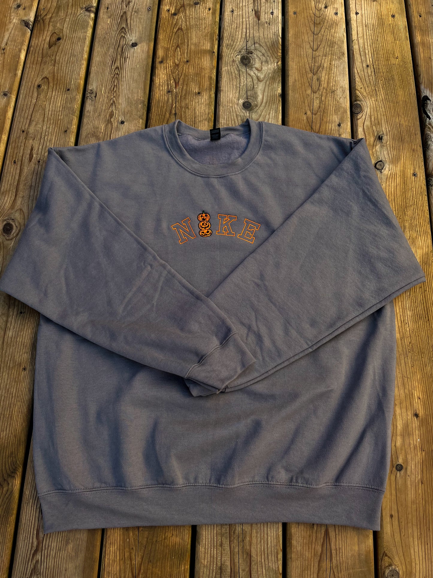 Nxke Pumpkin Stack Embroidered Sweater