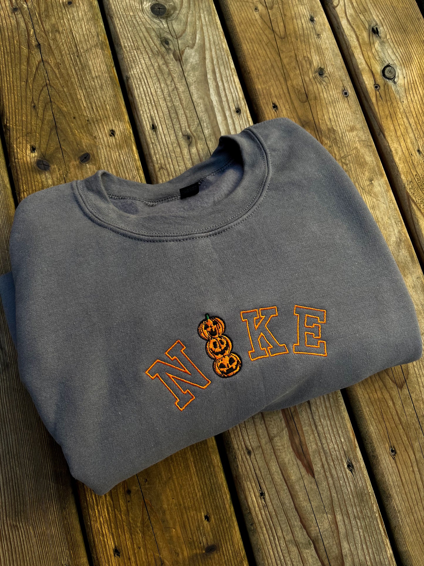 Nxke Pumpkin Stack Embroidered Sweater