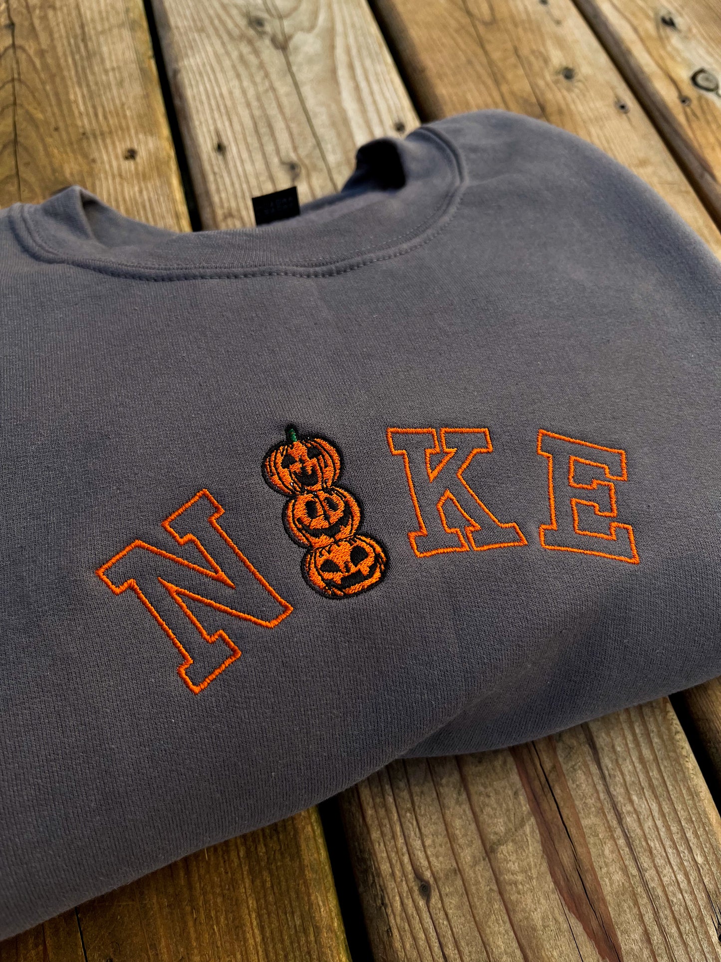 Nxke Pumpkin Stack Embroidered Sweater