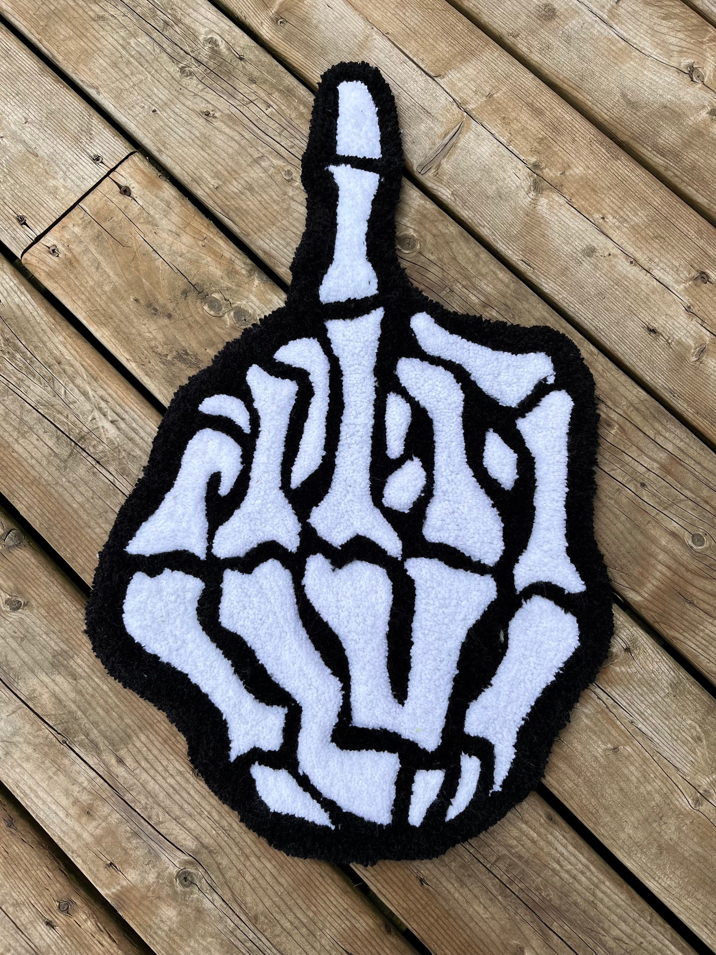 Skeleton Middle Finger Handtufted Rug