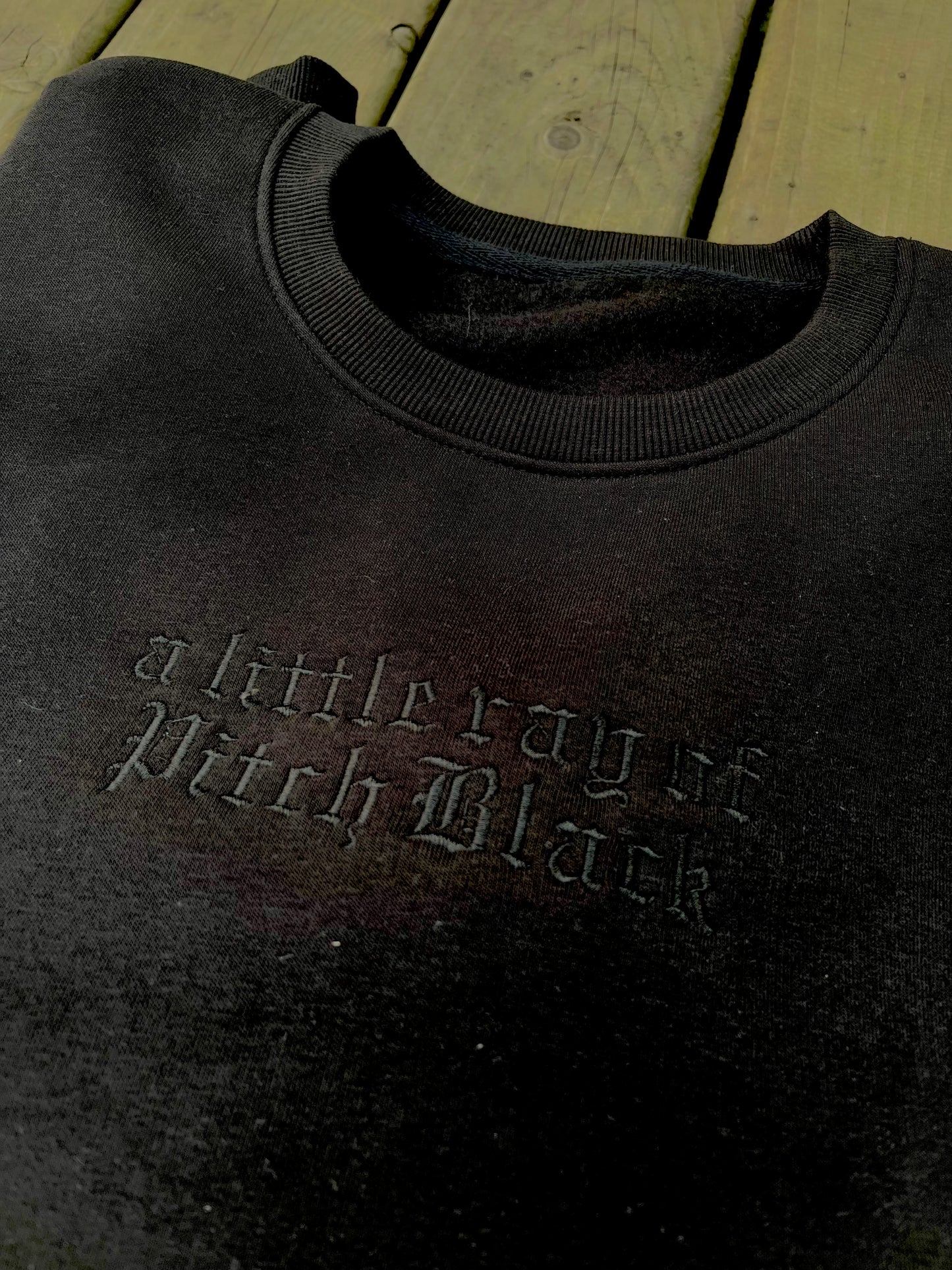 A Little Ray of Pitch Black Embroidered Sweater